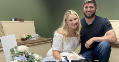 Couple holds last minute wedding at vets so senior dog can be there