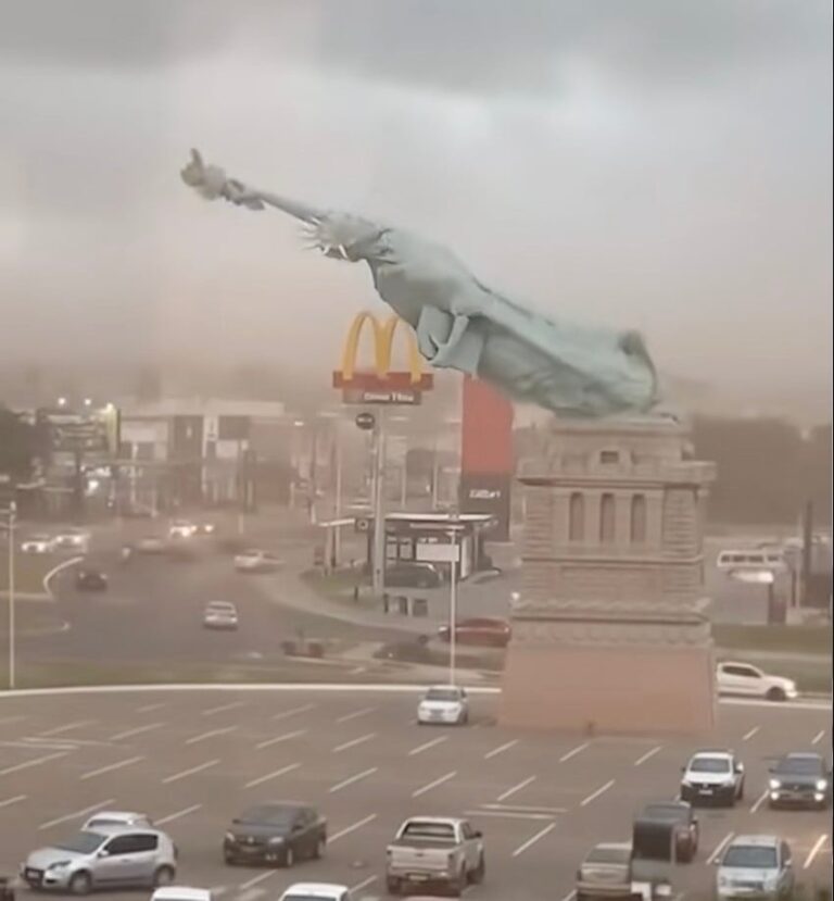 See What Happened to the 115-Foot Statue of Liberty Replica During a Storm